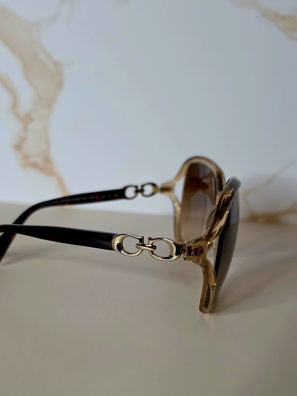 Coach Brown Sunglasses with Gold Linking Coach Symbols  Temples